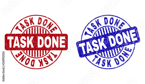 Grunge TASK DONE round stamp seals isolated on a white background. Round seals with distress texture in red and blue colors. Vector rubber watermark of TASK DONE title inside circle form with stripes.