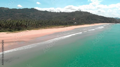 Flight over beautiful empty beach