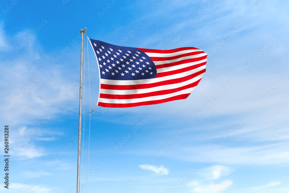 United States flag over blue sky background
