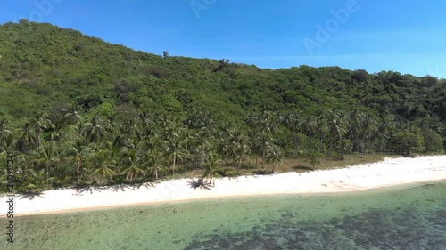 Flight over beautiful empty beach