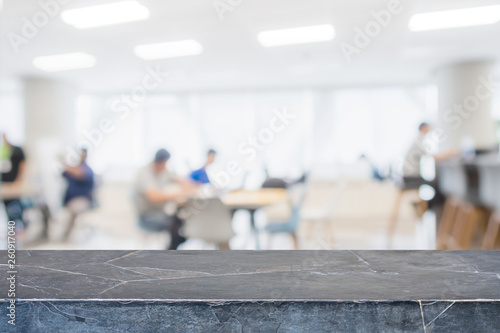 Empty black marble stone tabletop and blurred bokeh office interior space banner background - can used for display or montage your products.
