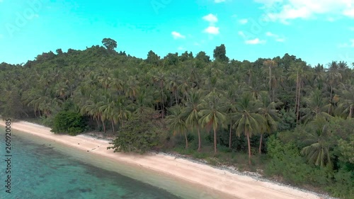 Flight over beautiful empty beach