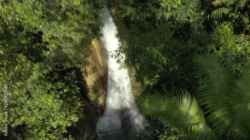 Drone crane shot at water fall, at Inambakan Falls, Cebu island The Philippines 4K. photo