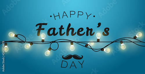 Happy Father's Day gift card. Garland light on blue background. photo