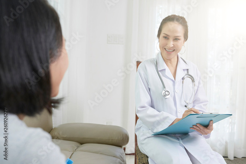 Medical specialist talking to patient