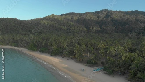 Flight over beautiful empty beach