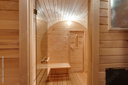 interior of  wooden bath in the form of a barrel. Rural mobile bath