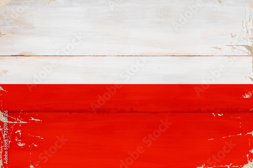 Flaga Polski namalowana na desce