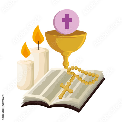 holy bible with chalice and rosary