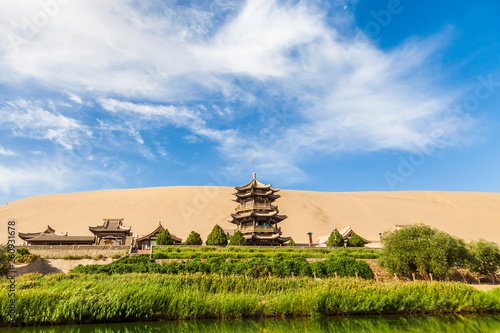 Gansu Dunhuang Crescent Lake and Mingsha Mountain.,China. photo