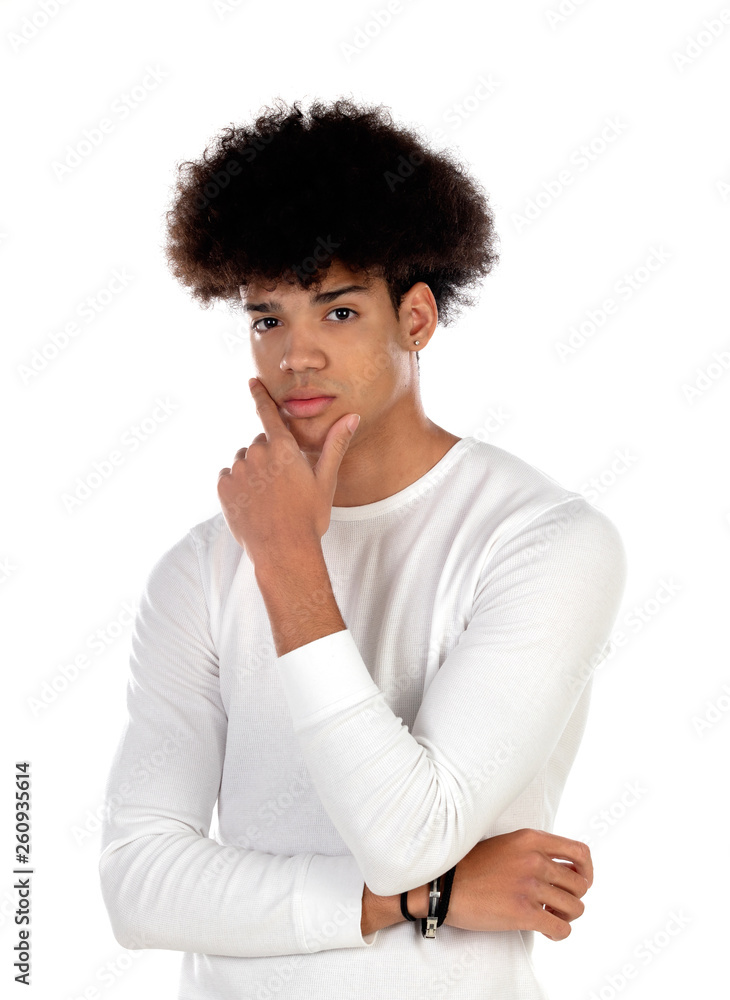 Pensive teenager boy wiht afro hairstyle Pensive teenager boy wiht afro hairstyle