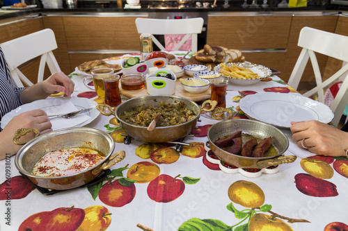 very nicely prepared breakfast table for special, valentines' day or Ramadan or Christmas in the room. Pasta, omelette ,salads, cheese on the table for party time