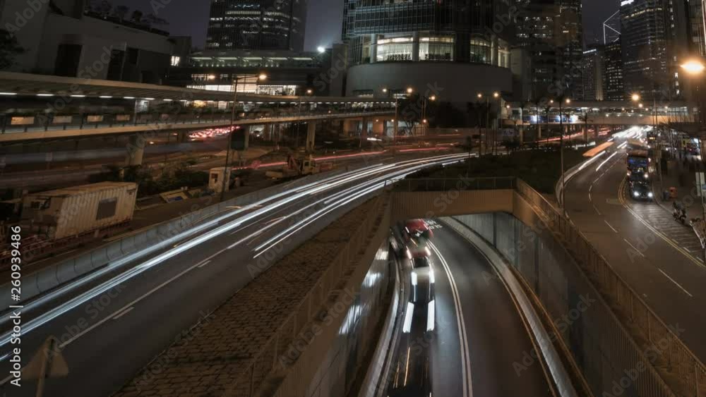 Timelapse of lights streak traffic in night city. Timelapse of lights streak traffic in night city.