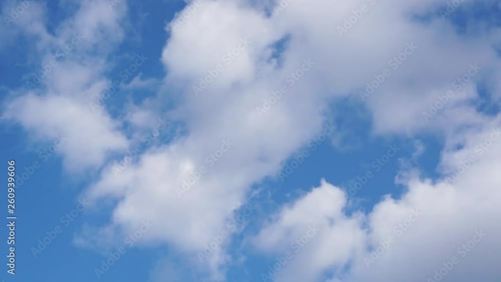white clouds move against the blue sky. Timelapse white clouds move against the blue sky. Timelapse