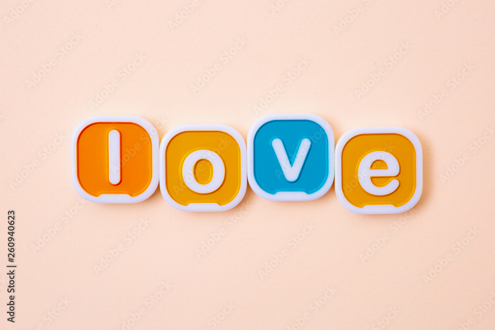 The word LOVE written with printing blocks. The word LOVE written with printing blocks.