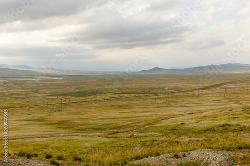 Mongolian Landscape of Orkhon Valley, Mongolian steppe with grassland and sky with white clouds