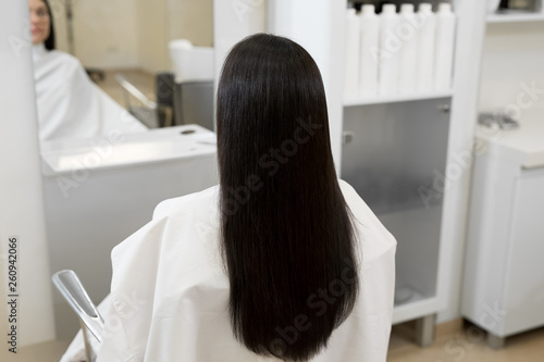 Strong, shiny and healthy long brunette hair