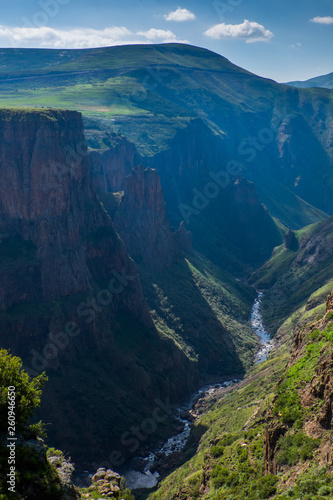 Landscape view of mountain valley with small river in Semonkong, Lesotho, Southern Africa