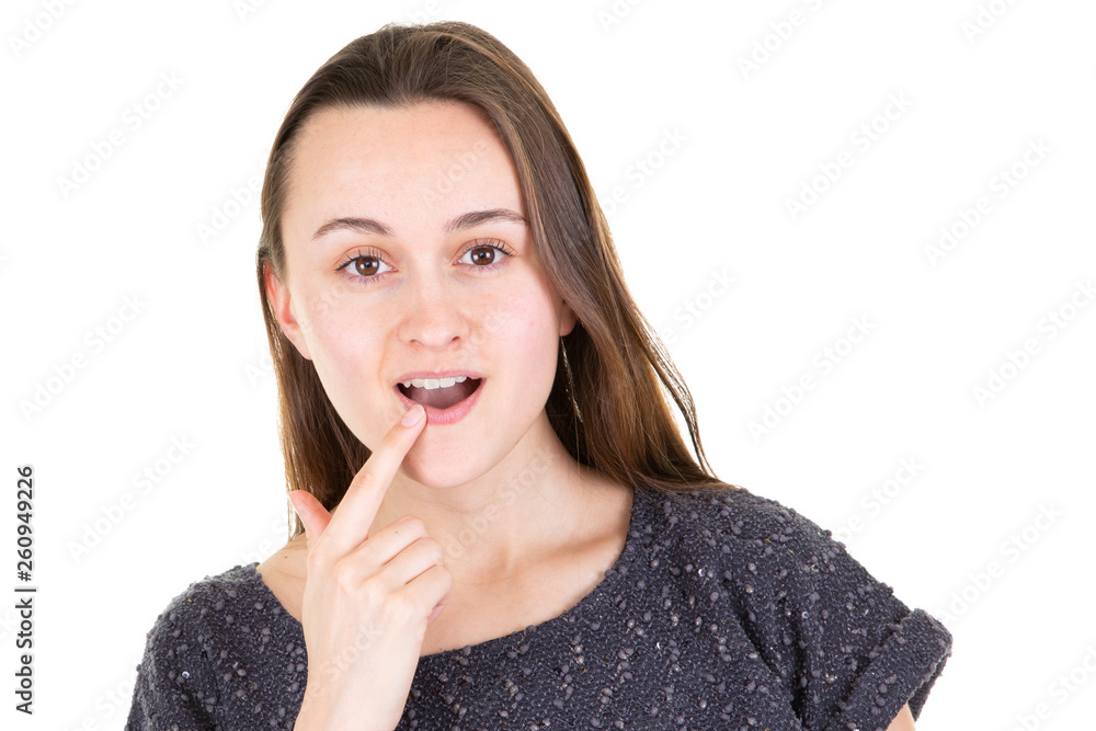 young emotional woman surprised the finger on the lip young emotional woman surprised the finger on the lip