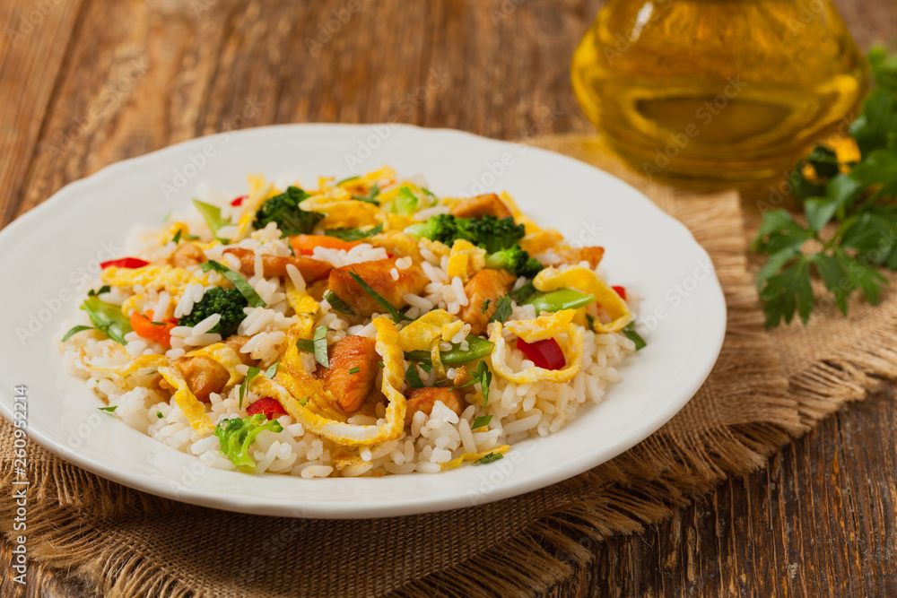 Nasi goreng. Fried rice with egg and vegetables. Nasi goreng. Fried rice with egg and vegetables.