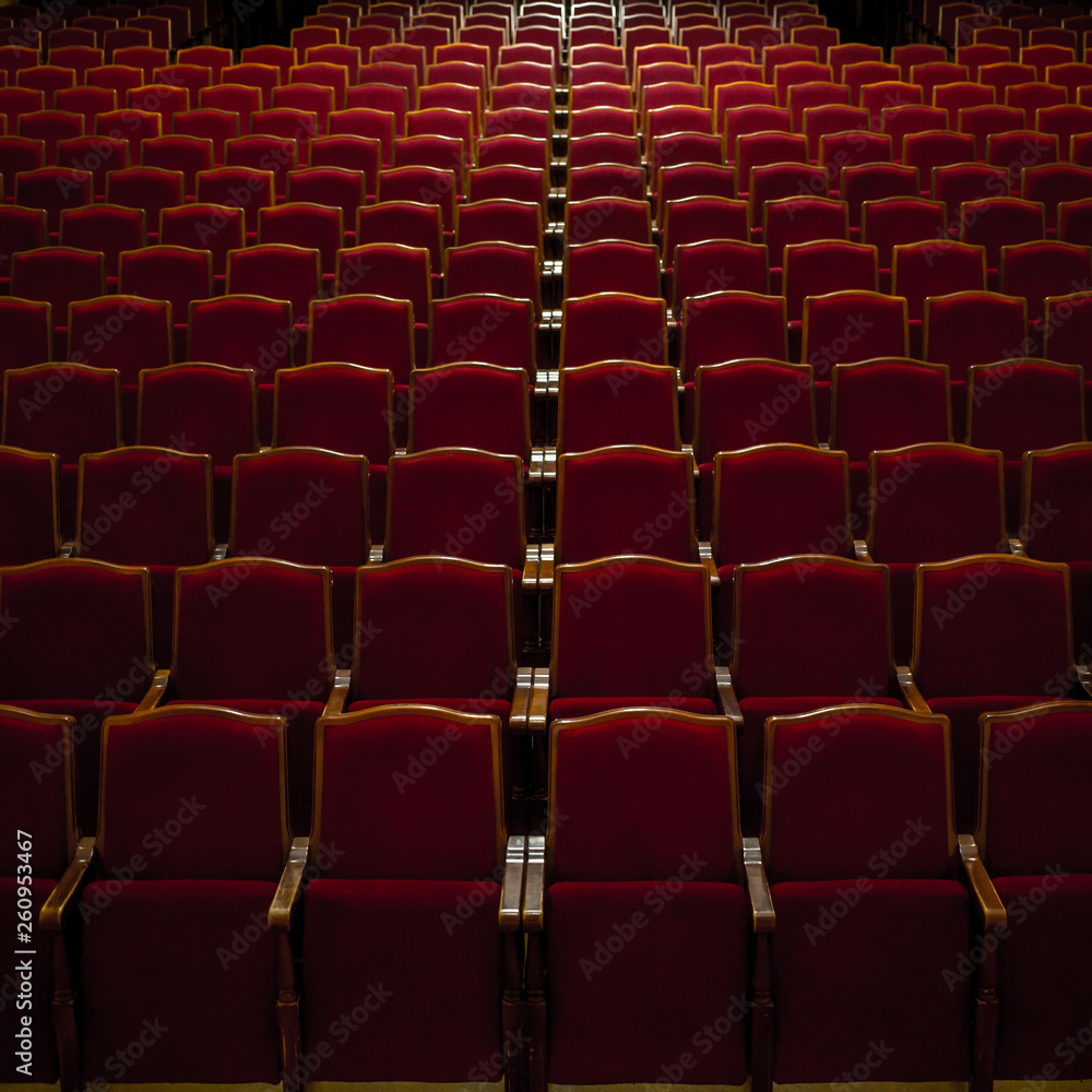 Empty comfortable red seats in a hall Empty comfortable red seats in a hall