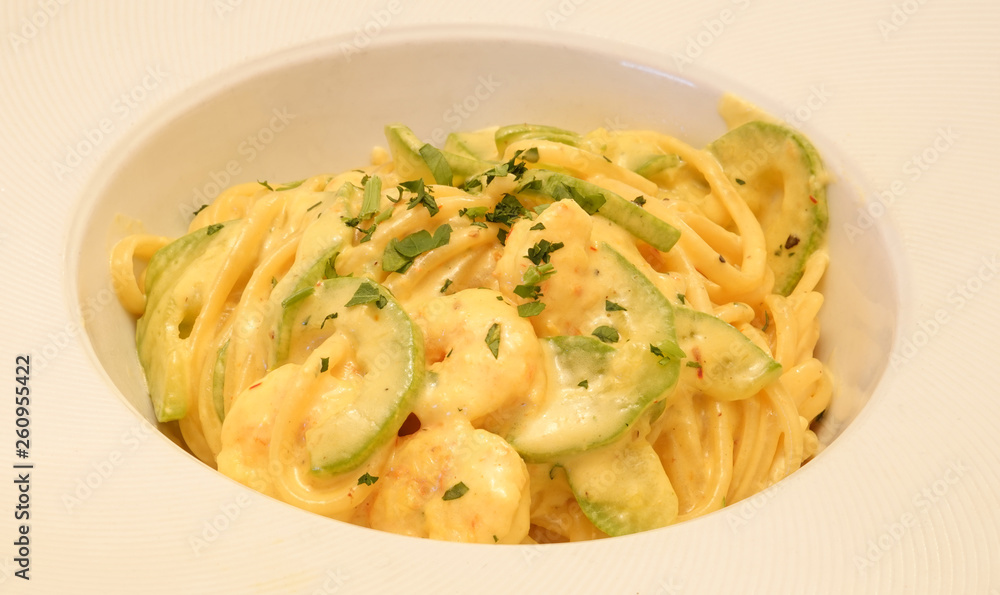 Pasta meal with prawns, saffron and zucchini delicious tasty cuisine dish