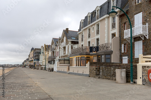 Front view of traditional granite houses along the promenade in Saint-Malo