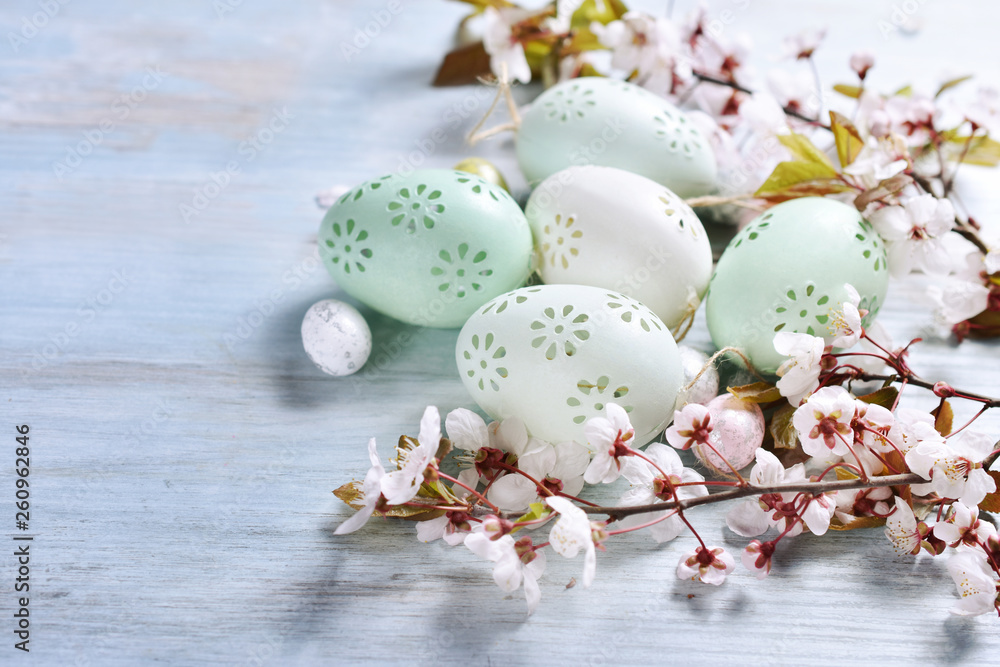 easter background with eggs and spring flowers