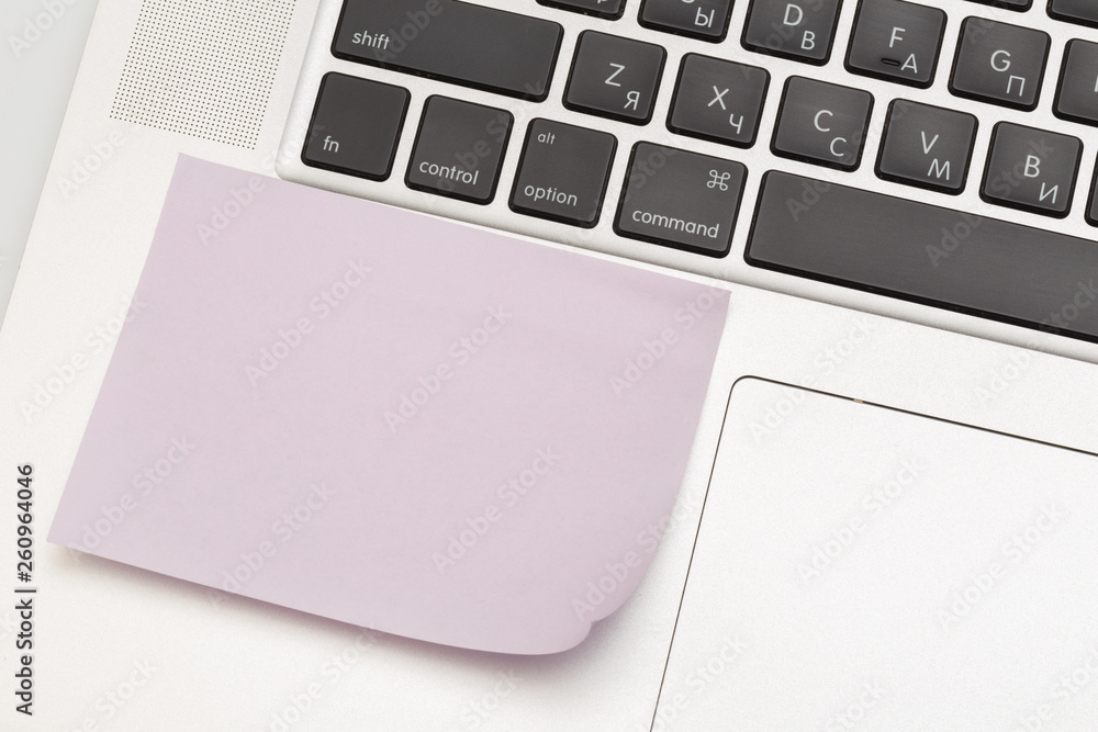 Sticky note on laptop with copy space. For all concept Sticky note on laptop with copy space. For all concept