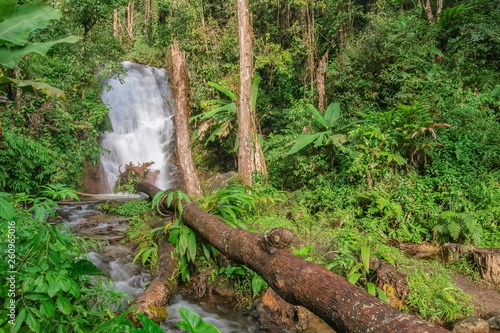 Siriphum Waterfall, beautiful waterfall flowing around with green forest background, Doi Inthanon National Park, Chiang Mai, northern of Thailand. photo