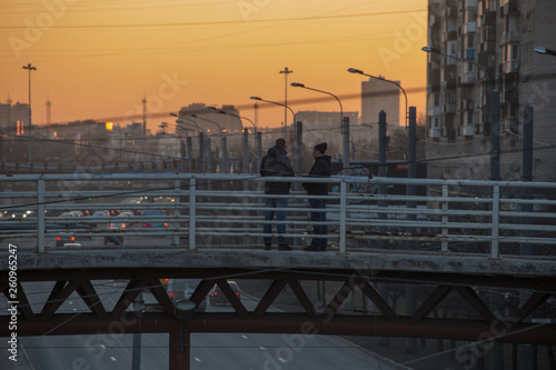 spring sunset sky weather walk city architecture boat snow melting people buildings constructions light 