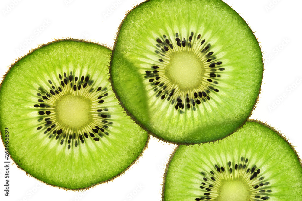 Slices of kiwi fruit on white background. Top view. Close up. High resolution product Slices of kiwi fruit on white background. Top view. Close up. High resolution product
