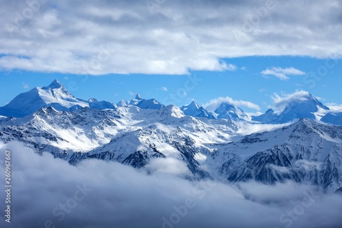 Swiss Alps scenery. Winter mountains. Beautiful nature scenery in winter. Mountain covered by snow, glacier. Panoramatic view, Switzerland, holiday destination for sports and hiking, wallpaper © Ji