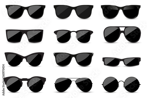Big set of fashionable black sunglasses on white background. Black glasses isolated with shadow for your design. Vector illustration. photo