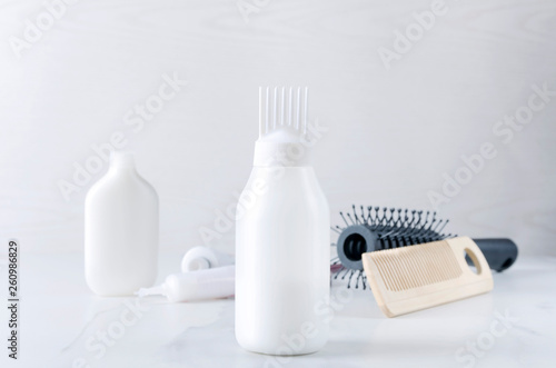 Hairdresser products for hair care at the salon.Plastic bottles with professional liquids for dye hair