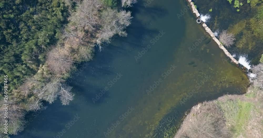 Aerial view by drone, with river landscape, Vouga river on valley and banks with typical Portuguese vegetation, on the mountains, in north Portugal Aerial view by drone, with river landscape, Vouga river on valley and banks with typical Portuguese vegetation, on the mountains, in north Portugal