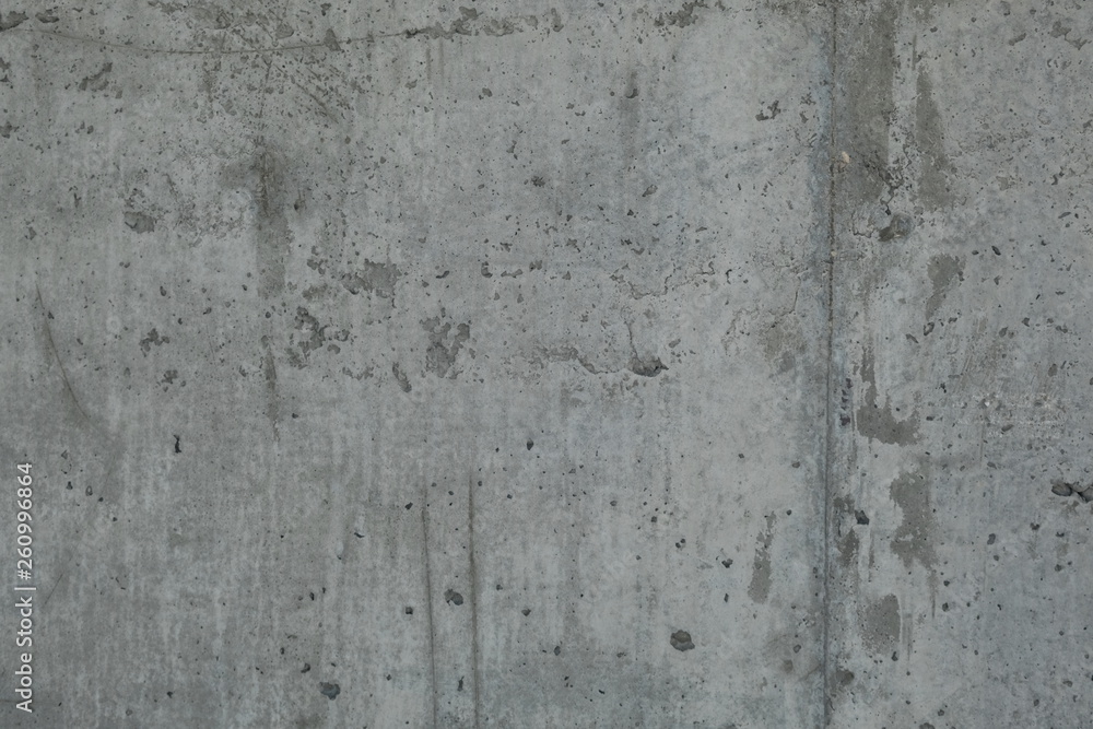 Grey concrete wall. Loft style concept, textured background Grey concrete wall. Loft style concept, textured background