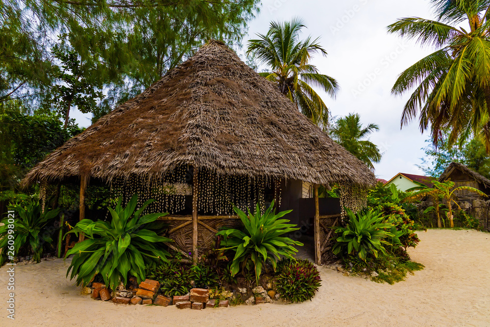 Thatched hut on the beach in Afrika