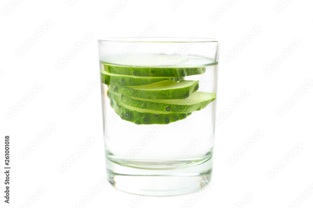 with cucumber in glass with cucumber in glass