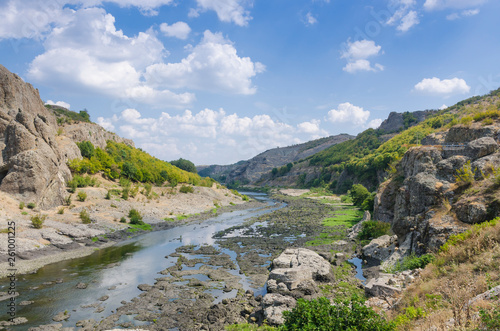 Abrasive basalt rocks at the bottom of the Arda River behind the Studen Kladenets dam, Bulgaria