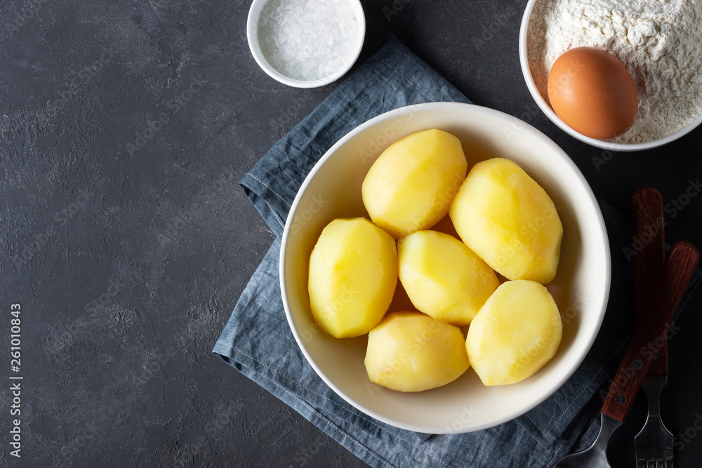 Ingredients for cooking Italian cuisine gnocchi - boiled potatoes, flour, egg and salt. Ingredients for cooking Italian cuisine gnocchi - boiled potatoes, flour, egg and salt.