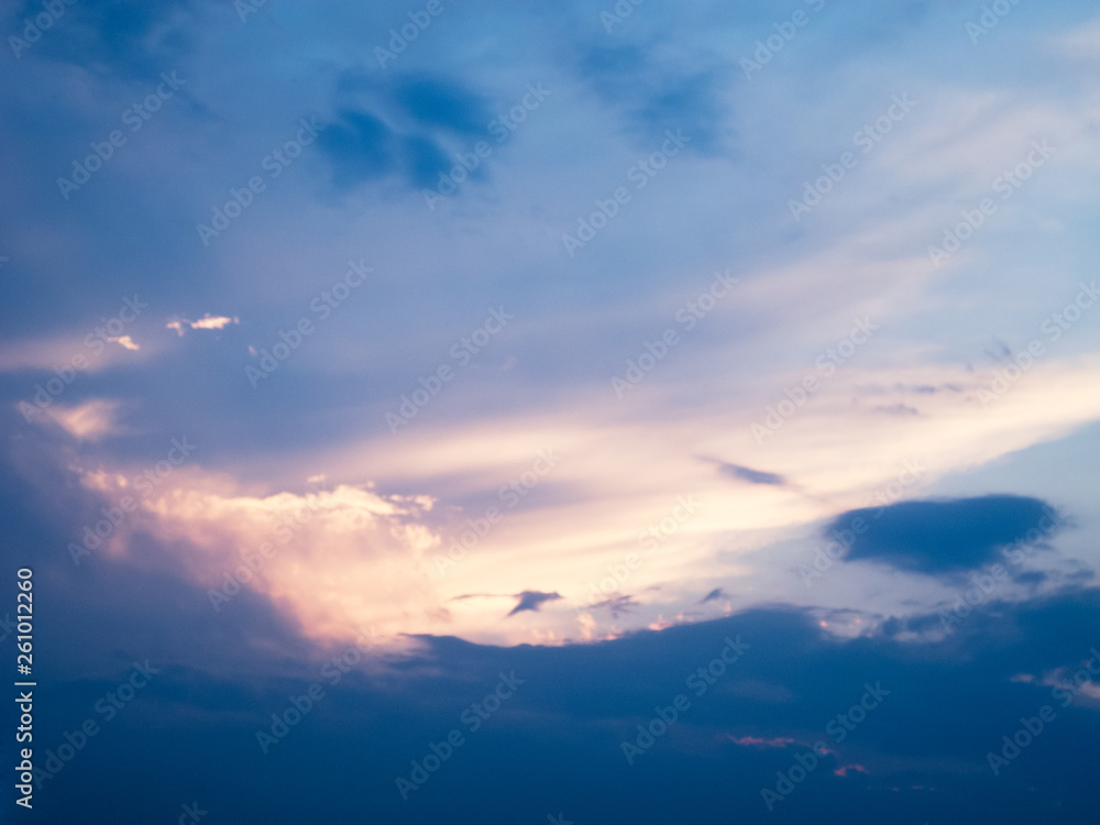 Beautiful blue sunset sky. Cloud like a flying dragon
