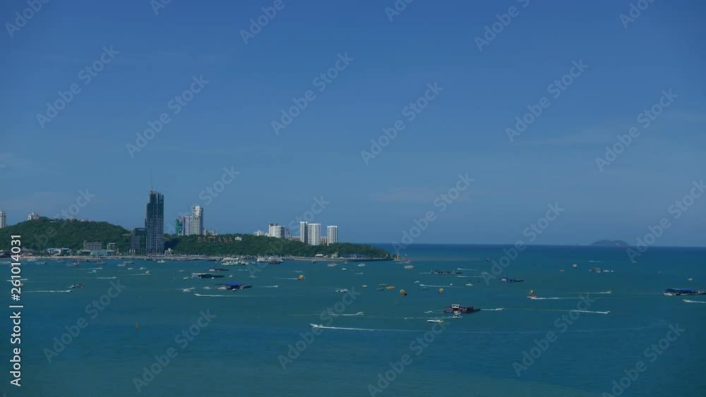 Pattaya city seascape time lapse of boats moving around in the bay, blue sunny day. Pattaya city seascape time lapse of boats moving around in the bay, blue sunny day.