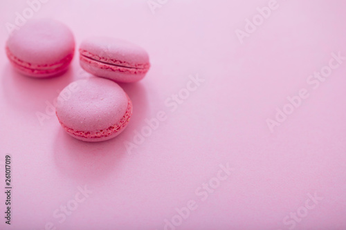 pink macaroons on pink background