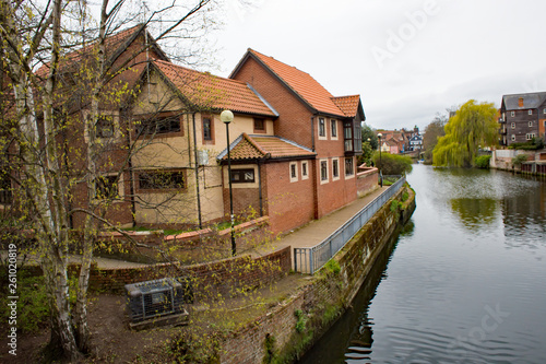 Expensive waterside apartments and penthouses on the quayside of the River Wensum in the city of Norwich, Norfolk