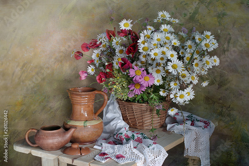 Still life with flowers , antique household items