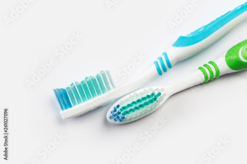 two new toothbrush on white background. concept