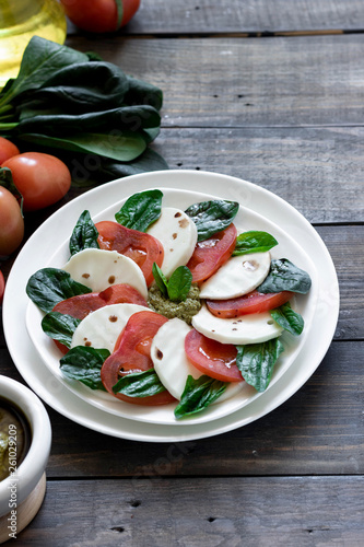 Caprese salad with pesto and balsamic vinegar