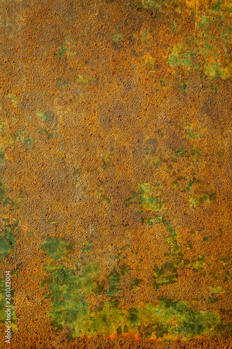  Old metal wall painted green and golden color for background use.