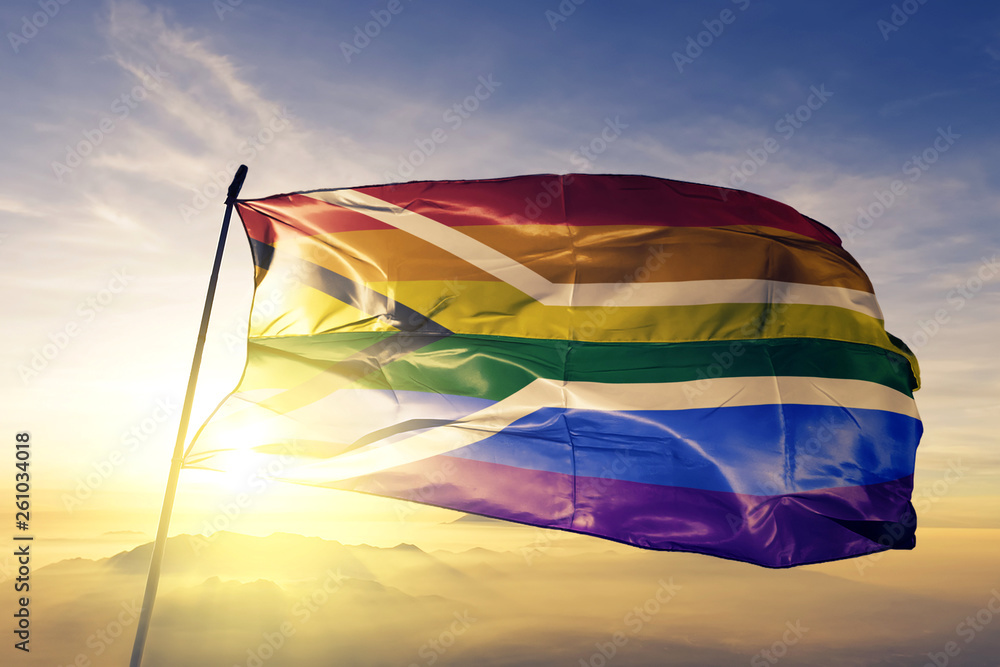 Gay pride of South Africa flag waving on the top sunrise mist fog Stock ...